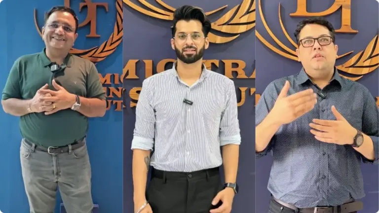 Three men speaking to the camera in front of the Dynamic Training Institute backdrop