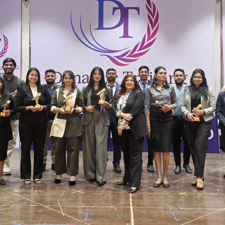 Dynamic Training Institute participants with their certificates