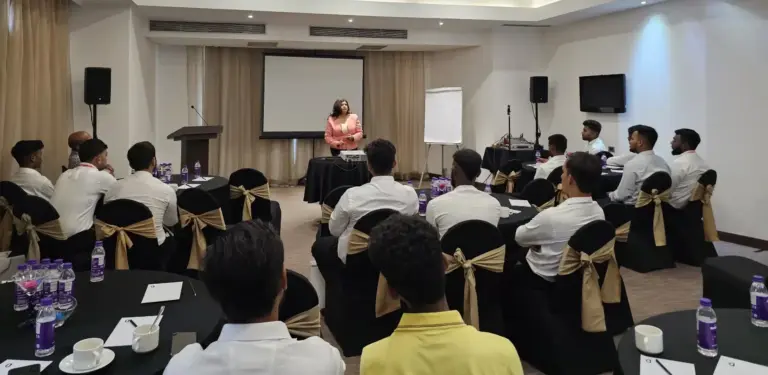 Tina Shah presenting to a corporate training batch at AtomX