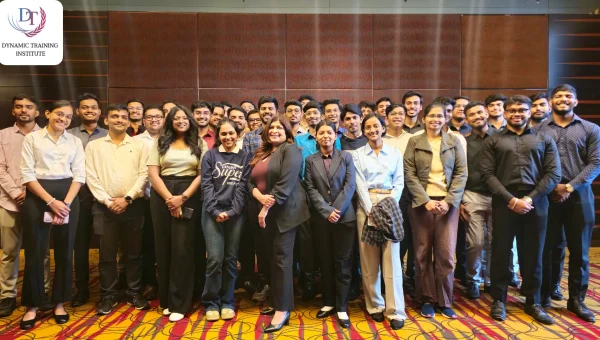 Group photo of a large batch of young professionals standing together